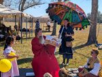 Princess Vittoria Buttercup reading to children at Bjornsborg Spring Event: As You Wish-a Fifteenth Century Frolic Photo by Escarlata de Granada